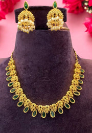 Simple necklace with green stone and gold finishing